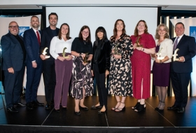 PFS Awards winners inc Emma Hall (4th from left) and Claudia Winkelman (centre). PFS CEO Don Macintyre is far left.