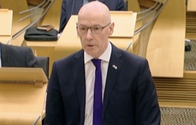 John Swinney delivering his Budget in Scotland today. Image: courtesy of Scottish Parliament