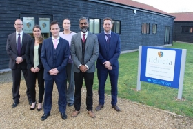 Fiducia Wealth Management advisors celebrate achieving Corporate Chartered Financial Planner status