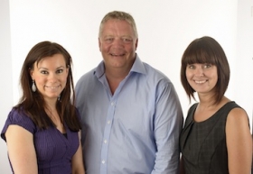 Simon Goldthorpe with Tamsin Hazell (L) and Hannah Mills